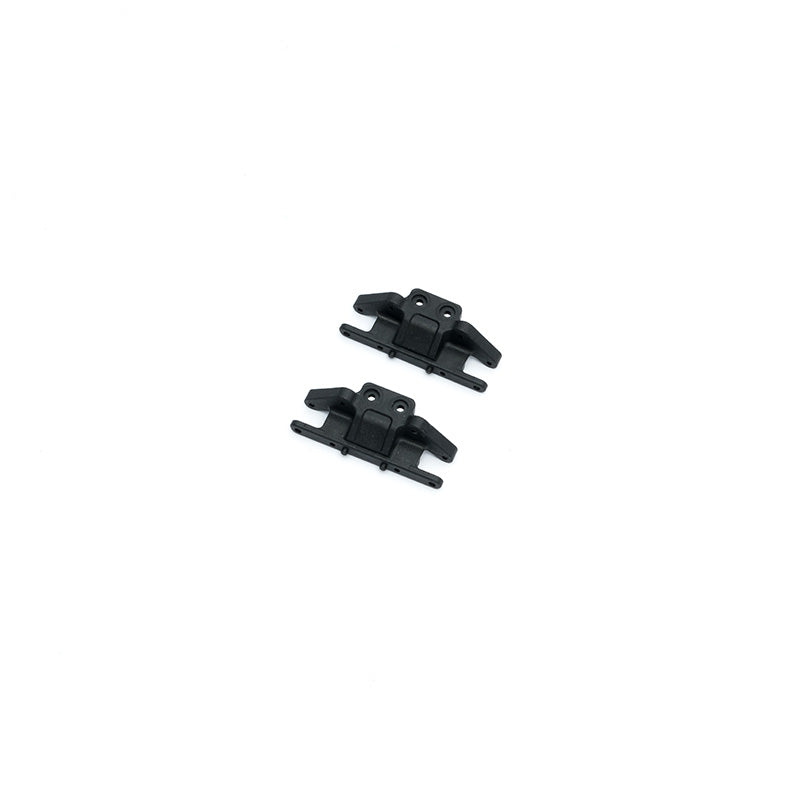 Black gearbox mounts for FCX24M RC models, enhancing performance and durability.