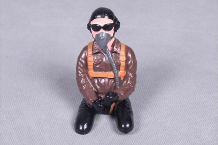 Scale model of a WWII pilot figure in flight gear