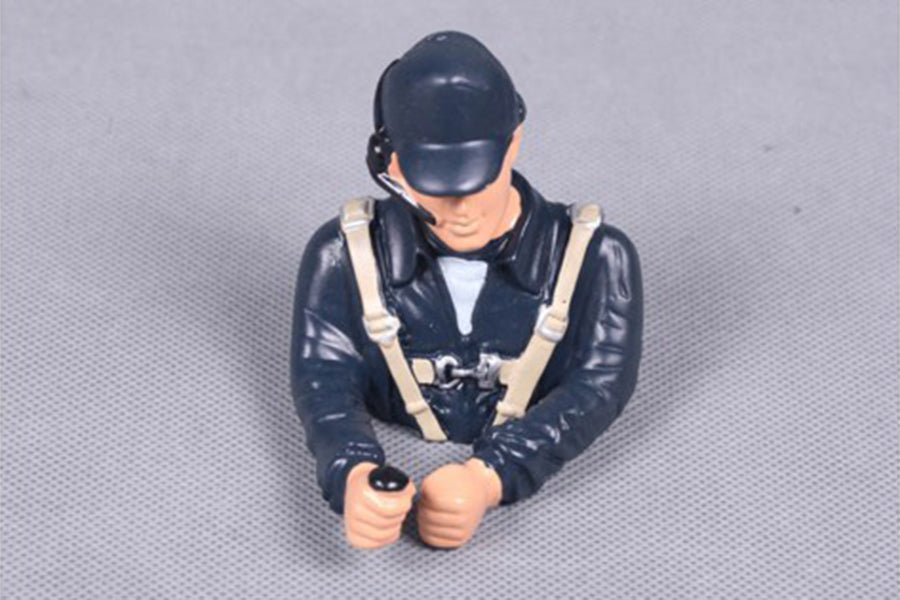Pilot figurine with headset, perfect for RC model aircraft setups