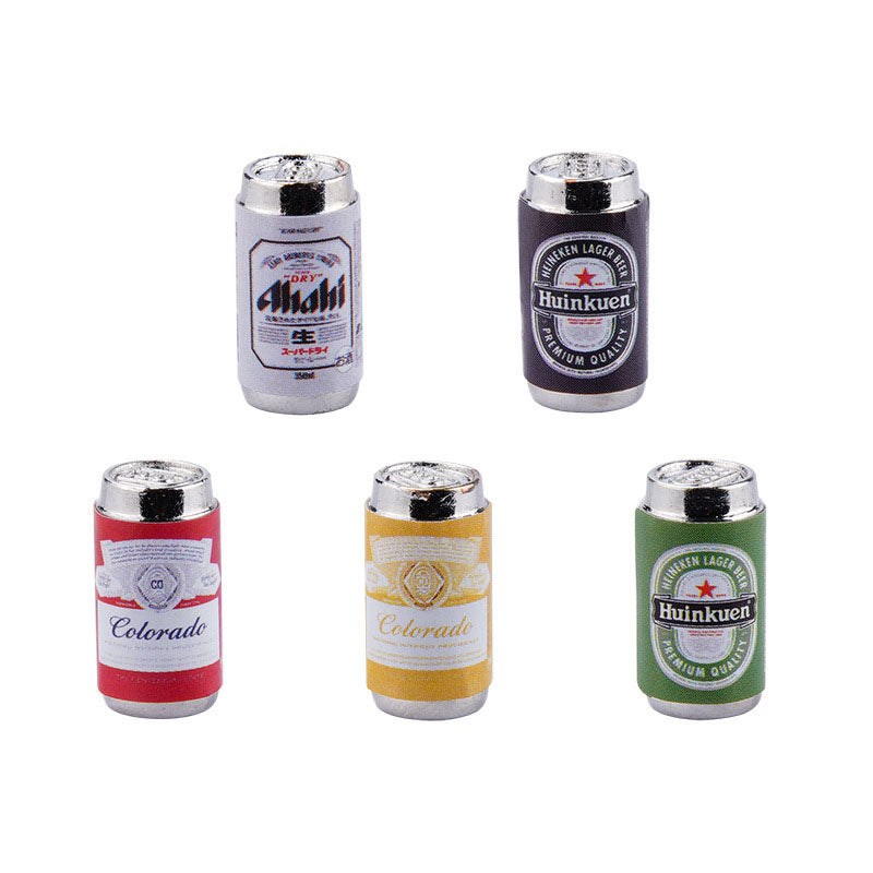 Five decorative mini beer cans with unique labels for party decorations.