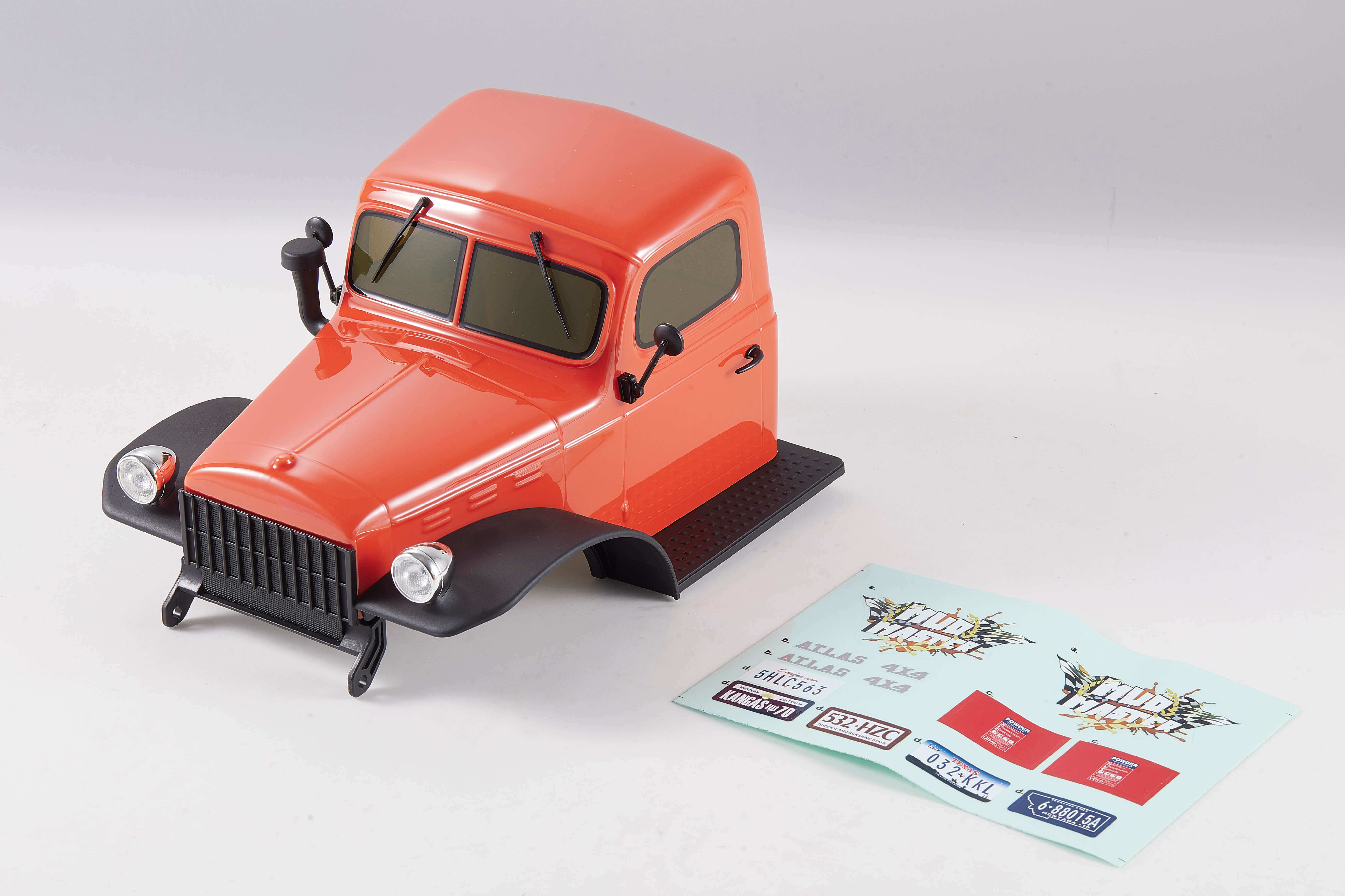 Orange 1:10 Atlas 4x4 car body with decals and assembly instructions