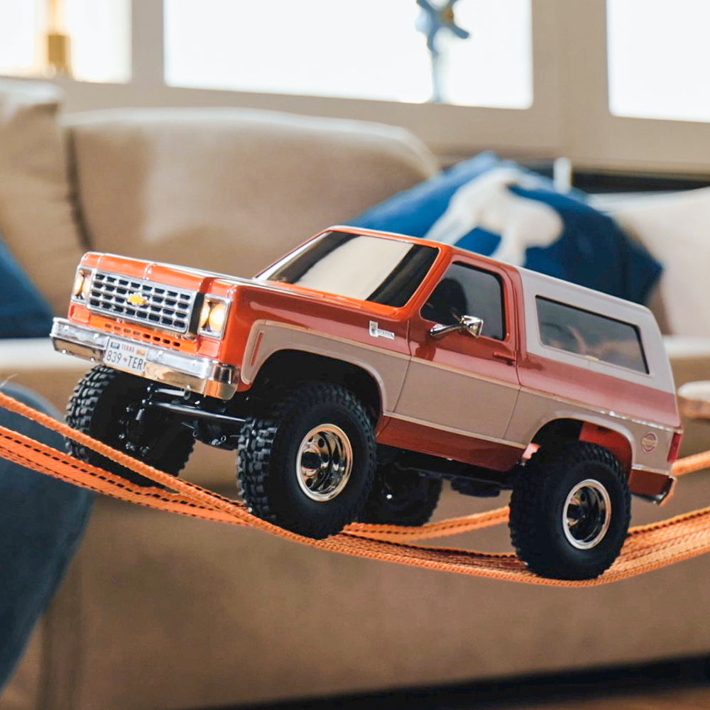 FMS 1:24 Chevrolet K5 Blazer RTR RC truck on rope in living room setting